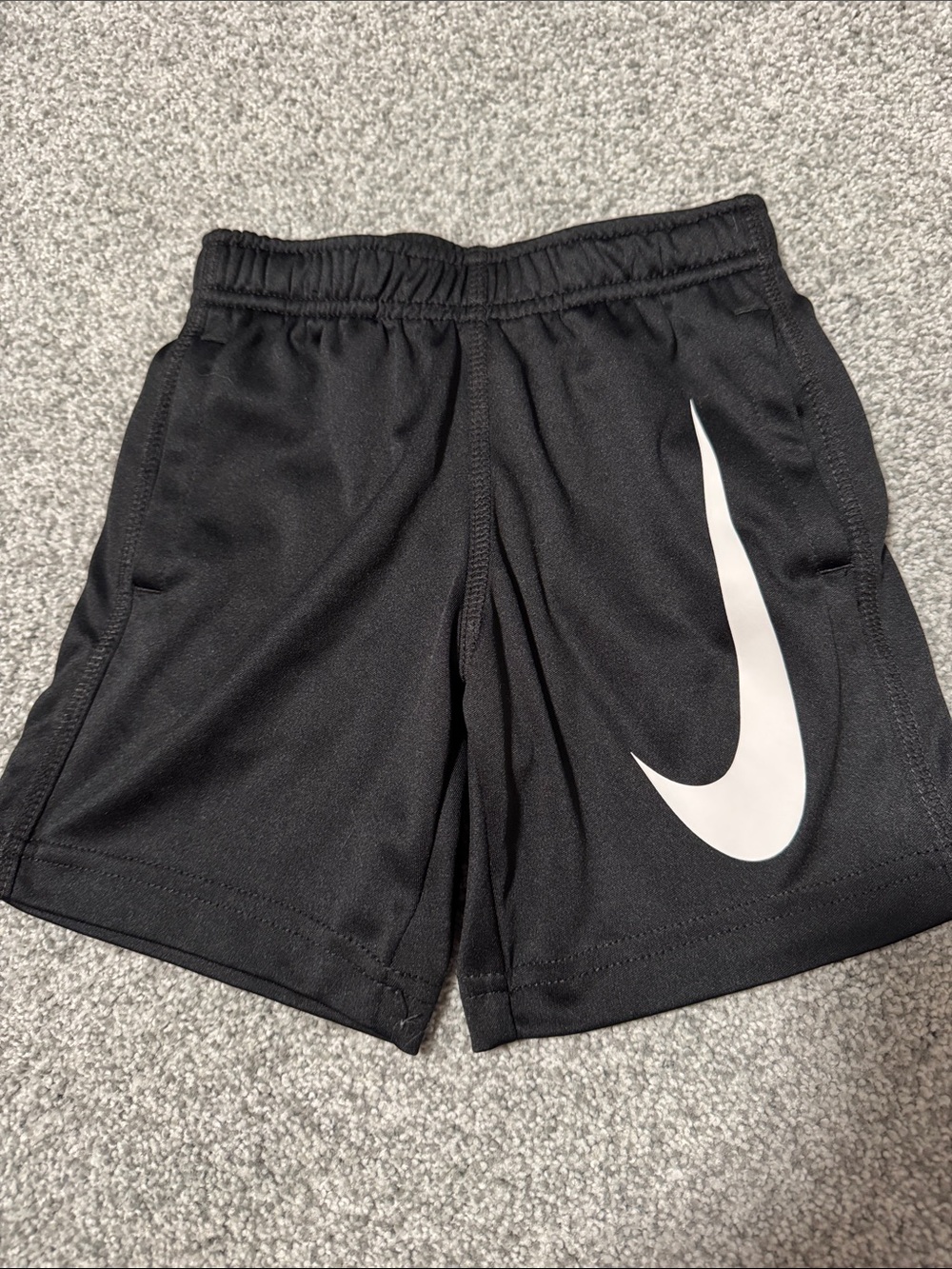 Nike Black Kids Shorts with White Swoosh Accent - Picture 1 of 2